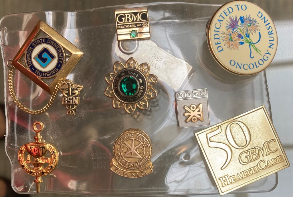 Pins of accomplishment gained through the years. Three Staffers Celebrate 35 Years of Care at GBMC-Gilchrist